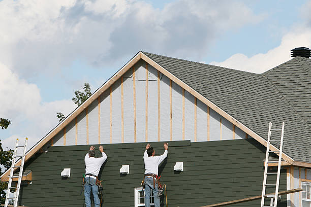 Professional Siding Replacement technician working in East Freedom, PA